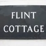 Sign for Flint Cottage.