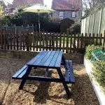 Garden bench at Flint Cottage.